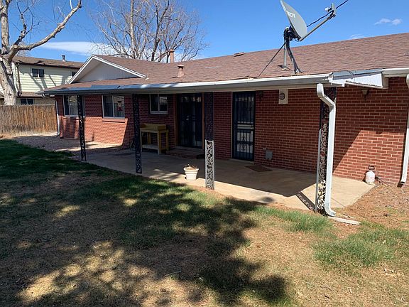 Medium sized backyard. Concrete covered patio,