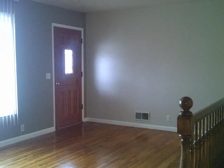 Living Room - Front Door/Front Window/Stairs