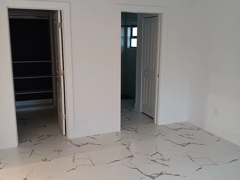Master closet and bathroom