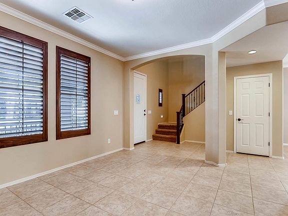 Living room with view of stairs