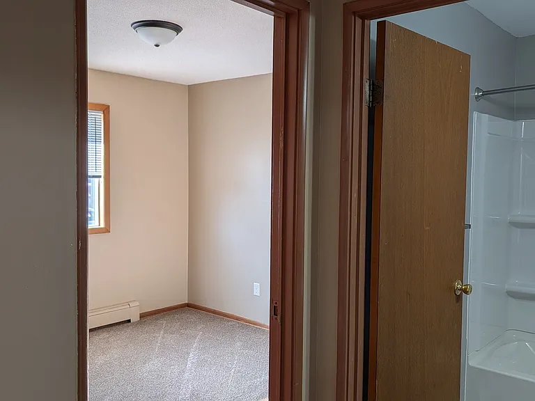 Hallway (bedroom on right, bathroom, bedroom on left)