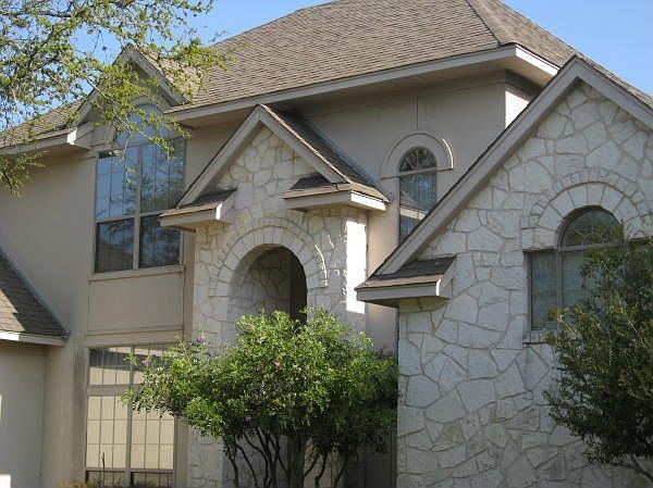 Well Maintained Stone & Stucco Home