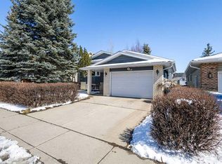 108 W Woodmont Dr SW, Calgary, AB T2W 4M3