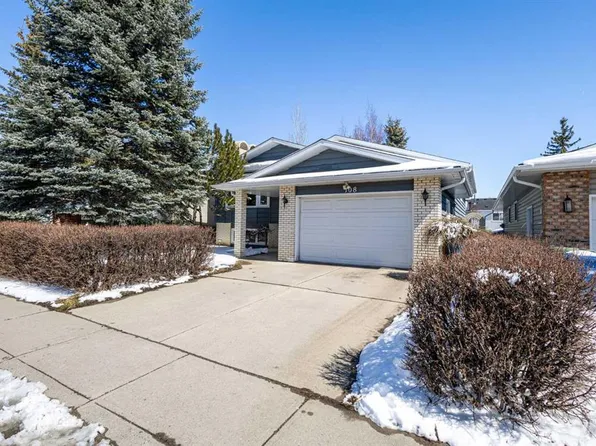 108 W Woodmont Dr SW, Calgary, AB T2W 4M3