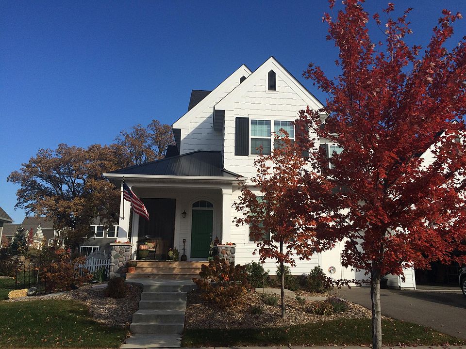 Confetti Maple tree in front. 