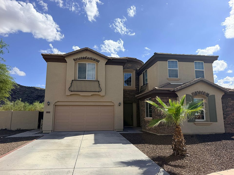 Freshly painted two-story custom home, South Mountain behind
