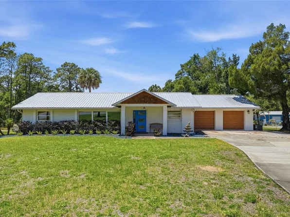 37237 GRAYS AIRPORT ROAD, LADY LAKE, FL 32159