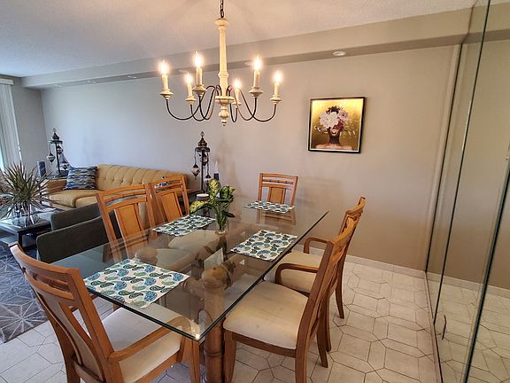 Dining area with living room view.
