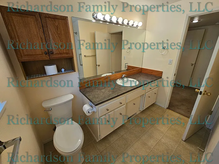 hall vanity and toilet