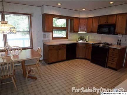 Kitchen
						:
						Large Eat-In Kitchen With New Microwave, Stove, Dishwasher