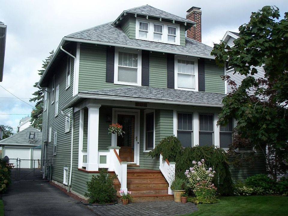 Entry with new porch and cobblestone patio