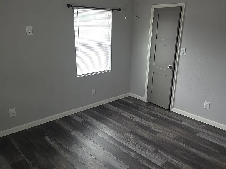 Bedroom 10x12 ft. with a closet .. ceiling fan and extra ceiling lighting.