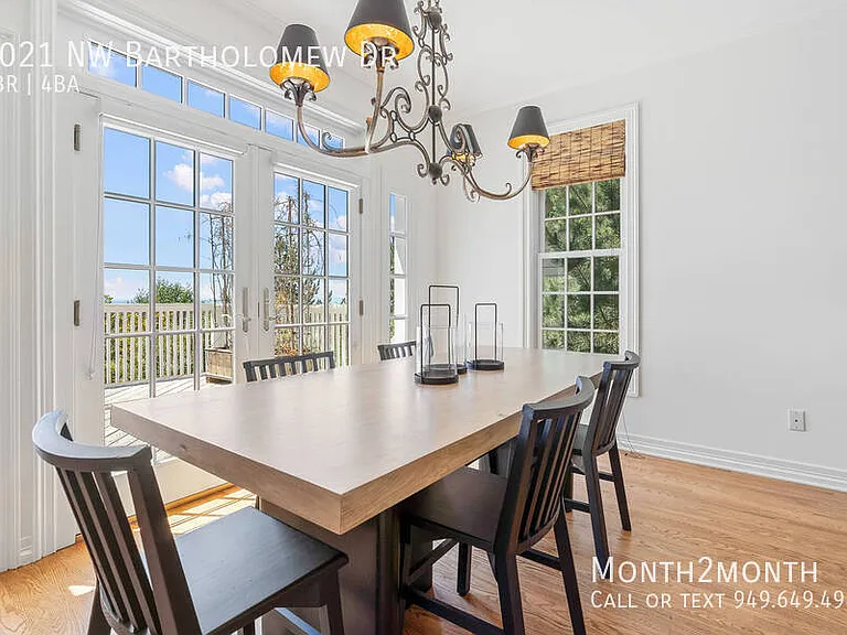 9021 NW Bartholomew Dr — Photo 3