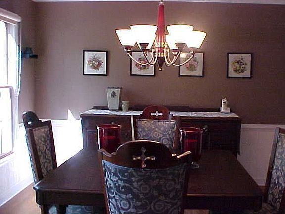 formal dining room with crown and chair