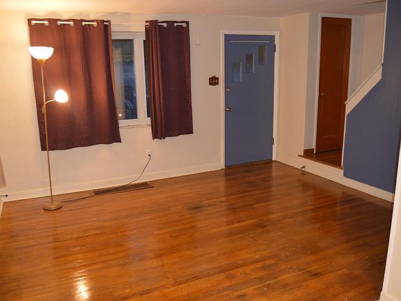 View of the living room area from the adjoined dining room.