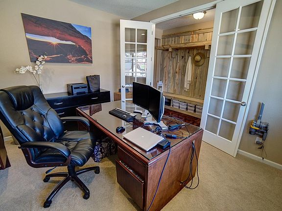 Office off the entry, with 8' french doors