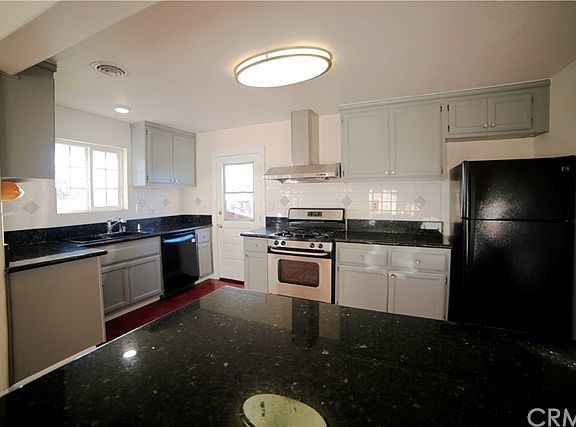 Gourmets kitchen with oak cabinets, granite counter tops, stainless steel appliances etc