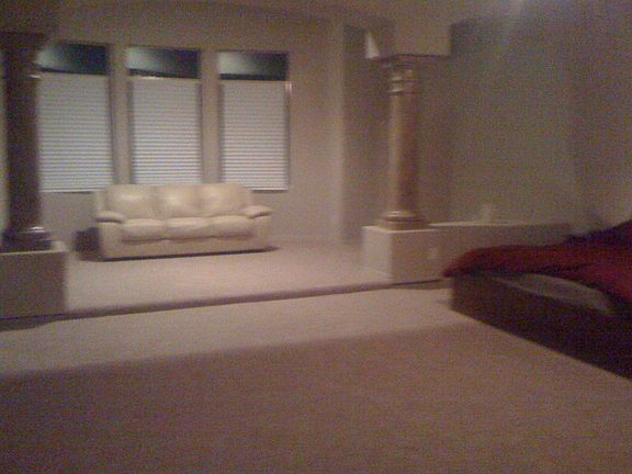 master suite with sitting area