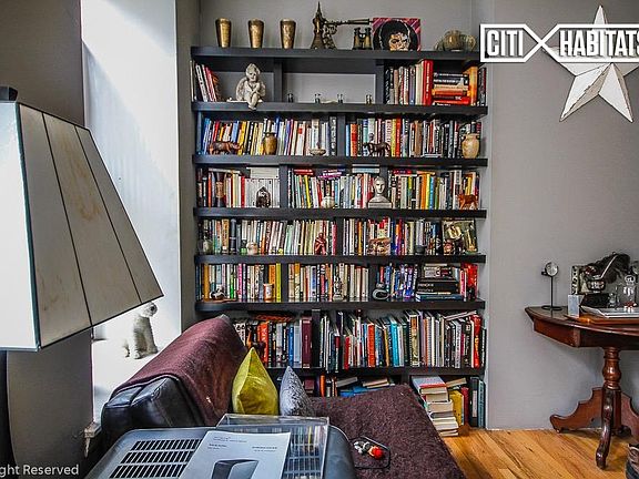 2nd image of 303 E 8th St APT 2F