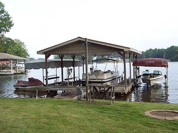 3-slip, covered dock with 3 lifts