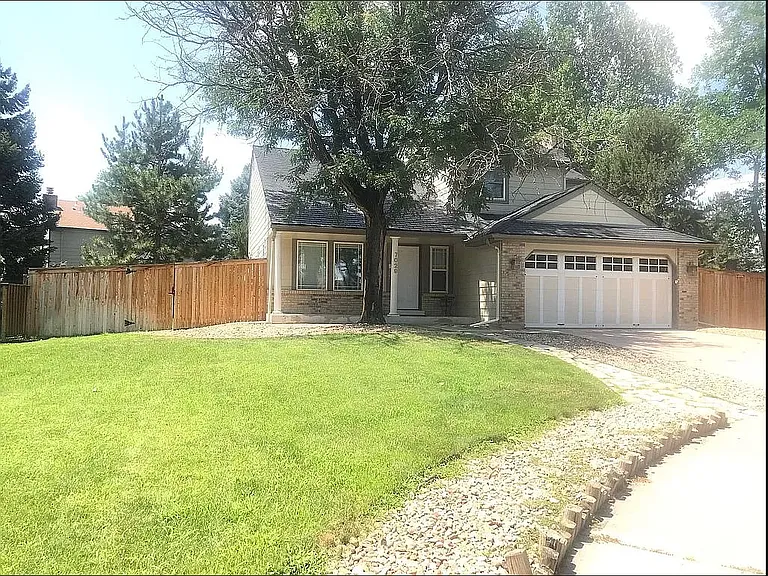 7029 S Dudley St — Photo 1