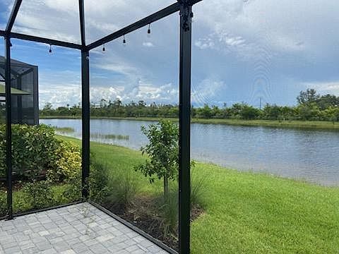 Screened Lanai overlooks the Lake