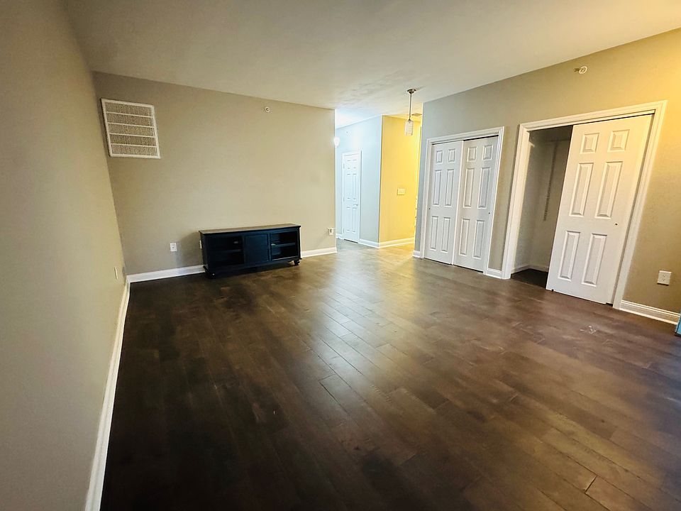 Large living room with endless decorating possibilities and beautiful hardwood flooring!