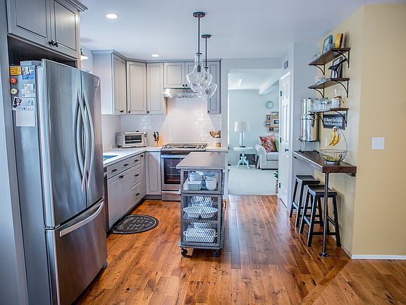 Kitchen flows to LR/playroom