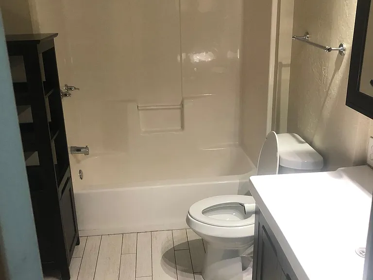 Second full bathroom with a tub