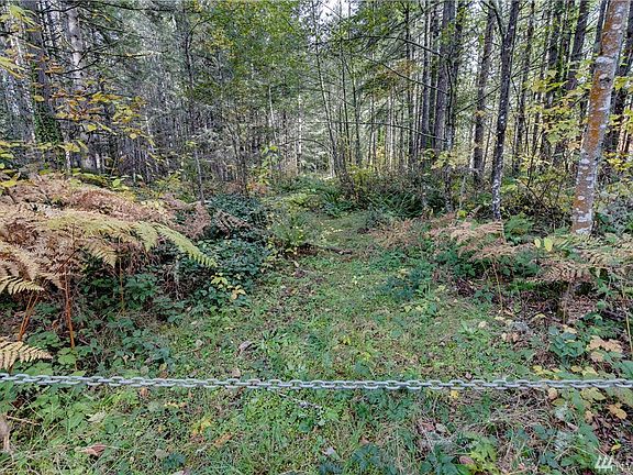 Old access road leads to original home site about 400' from road. Park along the road or at Sands Ave Ball Fields and walk down the access road to view the property.