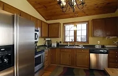 Kitchen will be updated with new cupboards, granite countertops and new window prior to move-in. - 1761 Sumach Ln