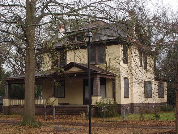 Side (Lot next door also available for sale by us)