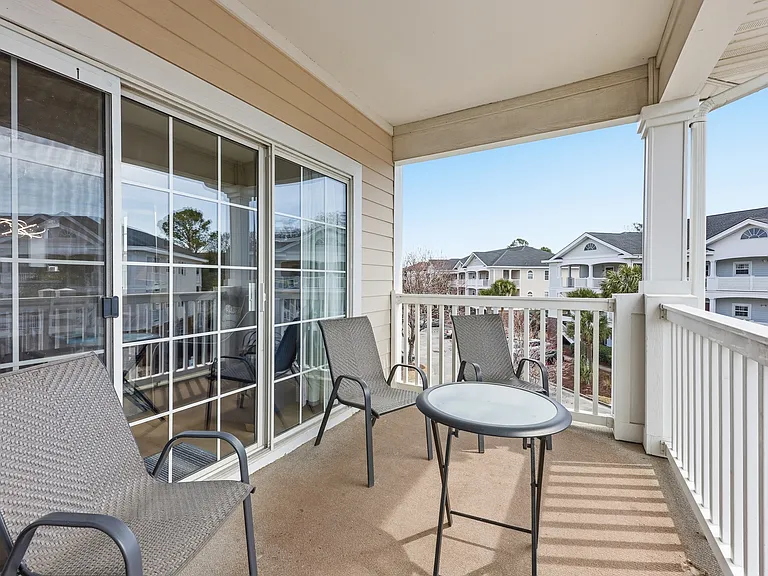 Balcony seating area ideal for coffee, conversation, or unwinding.