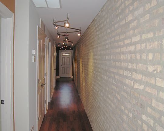 Exposed Brick wall in hall