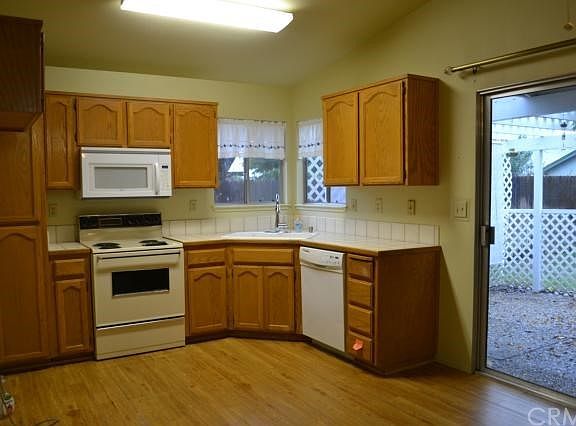 Kitchen opens to backyard