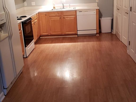 Kitchen with washer and dryer