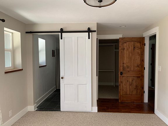Master bedroom bath (on left) and walk-in closet (on right)