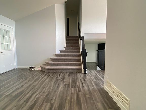 Front room corner view to stairway