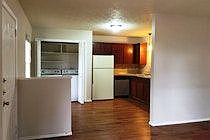 Plenty of room for a dining table. kitchen has been updated. No carpet. Wood laminate floors throughout