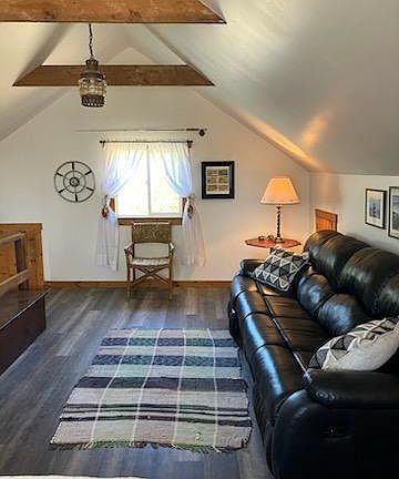 Upstairs Natical,themed entertainment room, with tv and views of Mt. Baker and the orchard, double bed awesome view!