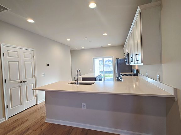 The kitchen of the Northgate on homesite 1009 at Hiatt Pointe at Snowden Bridge.