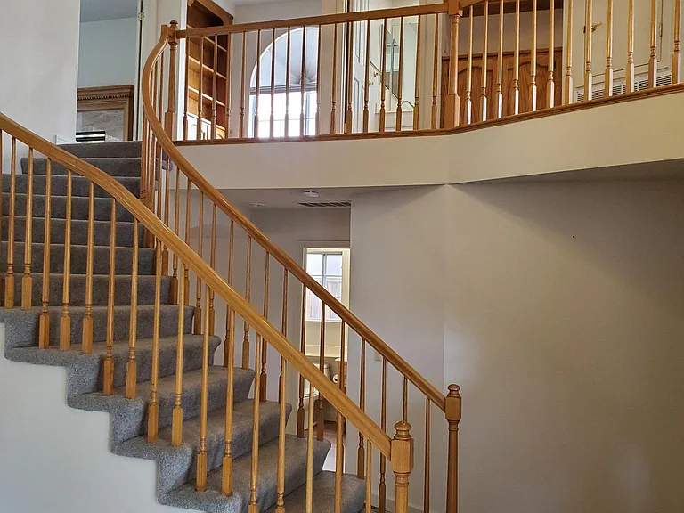 front-door entry looking to upstairs 2nd-floor stairs access.