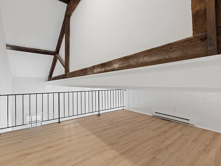 Unit #302 Loft with original beams from 1860's
