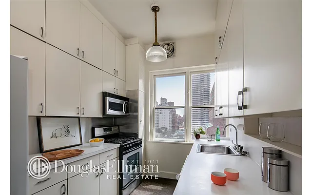 Sold by Douglas Elliman | media 23