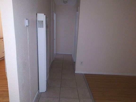 Hallway to the bathroom and the bedroom