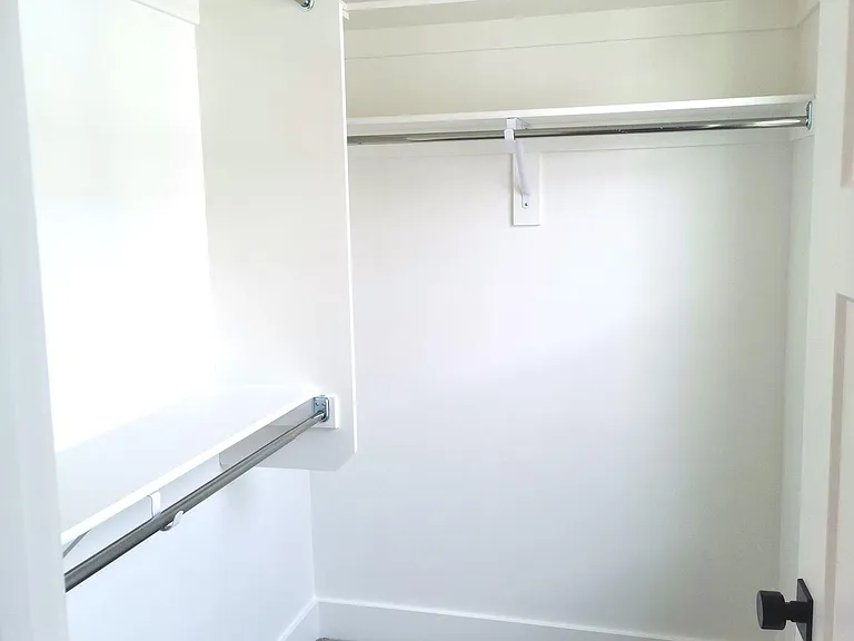 walk-in closet in master bedroom