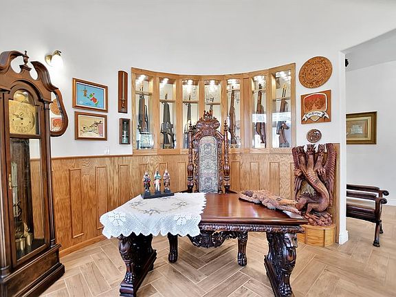 Enter into the 2 story high foyer with exquisite displays