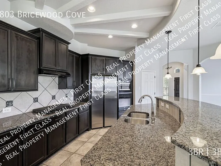 9803 Bricewood Cv — Photo 14