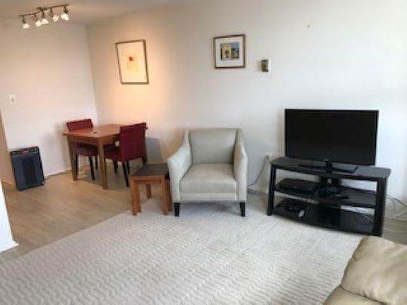 Living and dining area, TV and TV stand