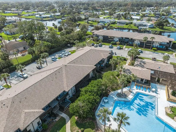 40 CLUB HOUSE DRIVE #107, PALM COAST, FL 32137